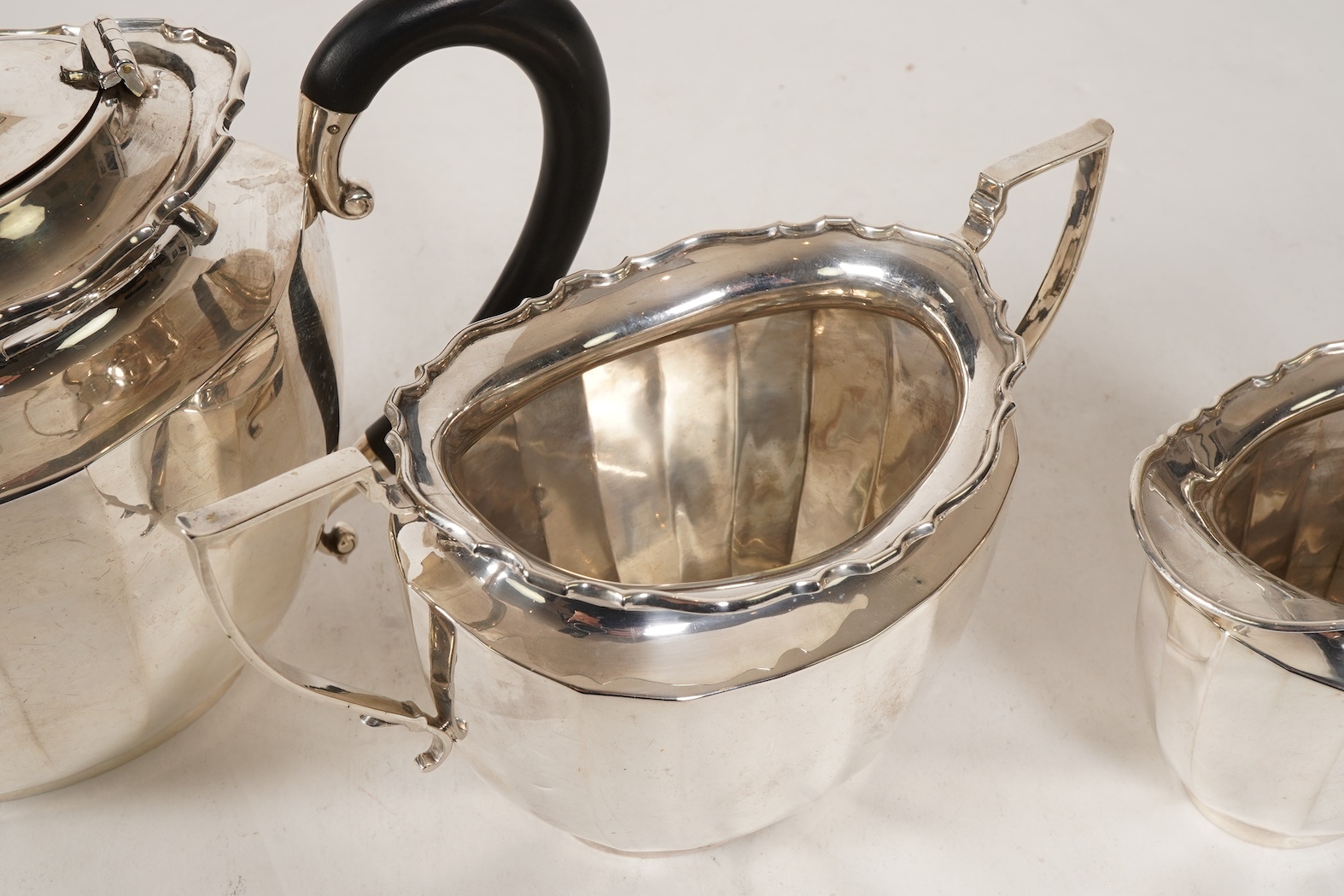 A George V silver three piece tea set by William Devonport